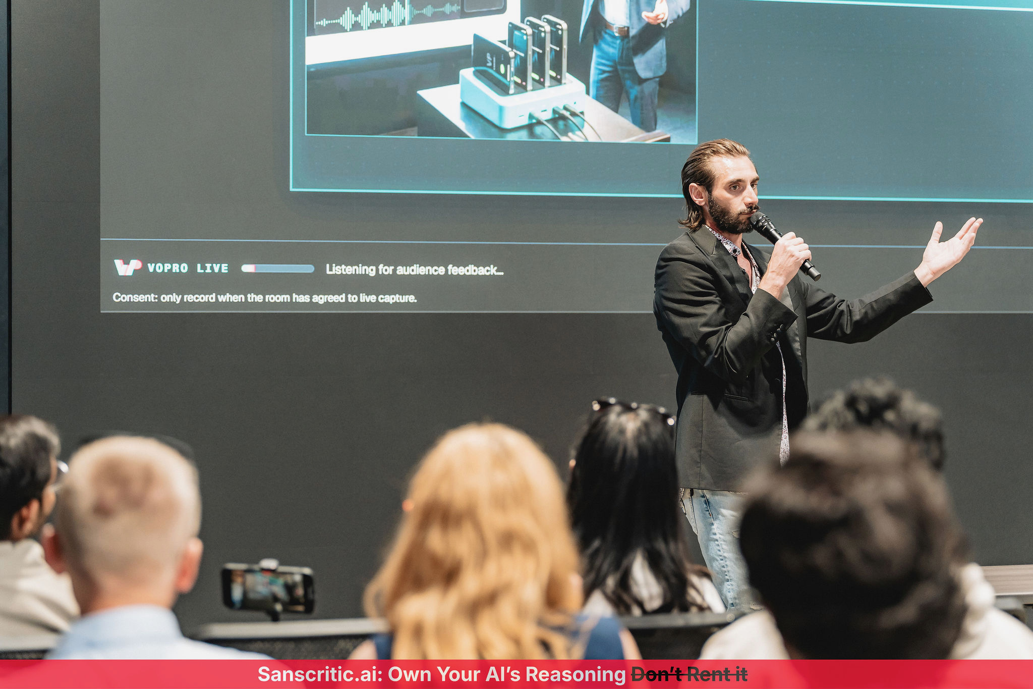 Patrick presenting VoPro to seated founders and operators